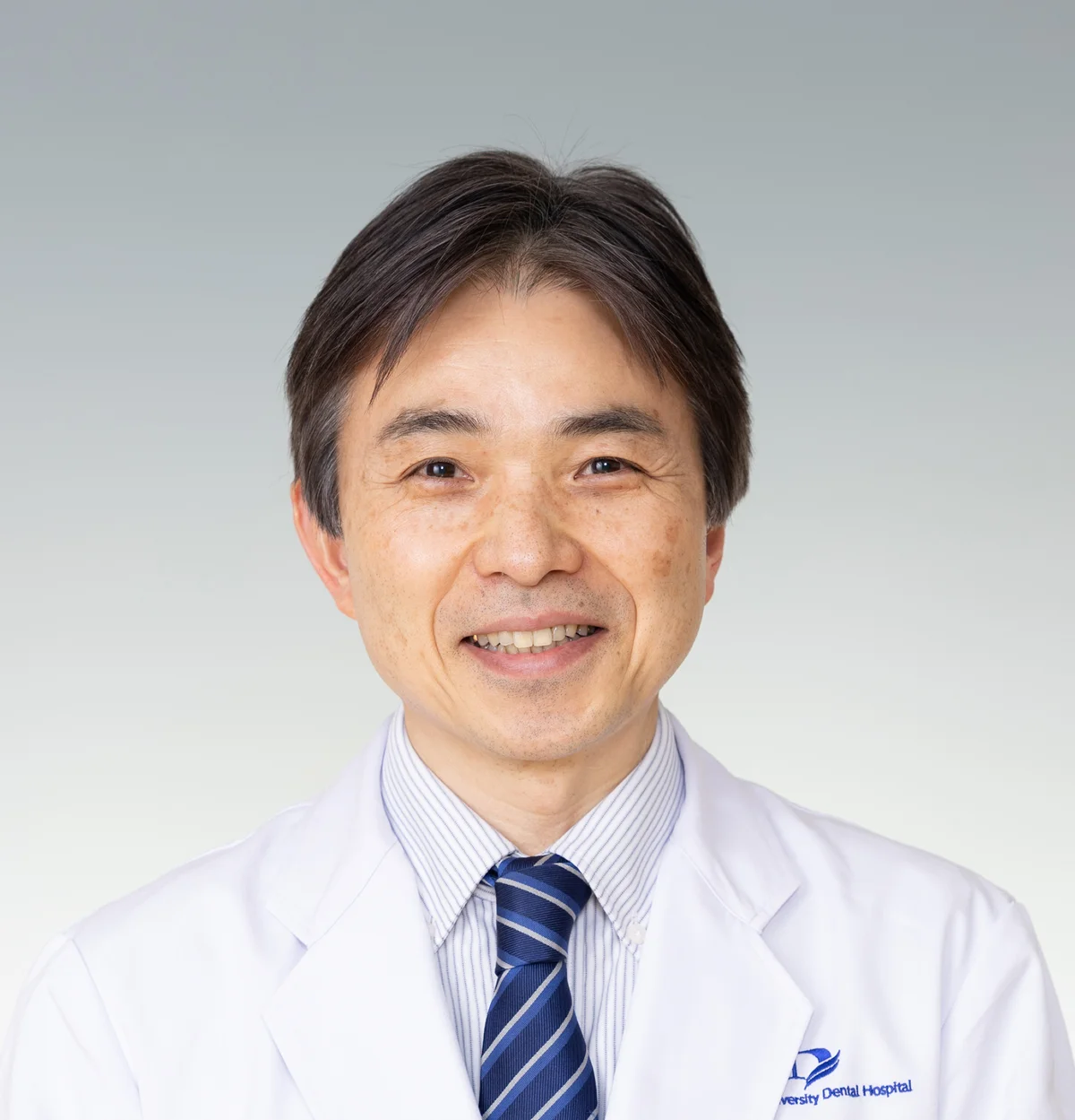 阪井丘芳先生プロフィール画像