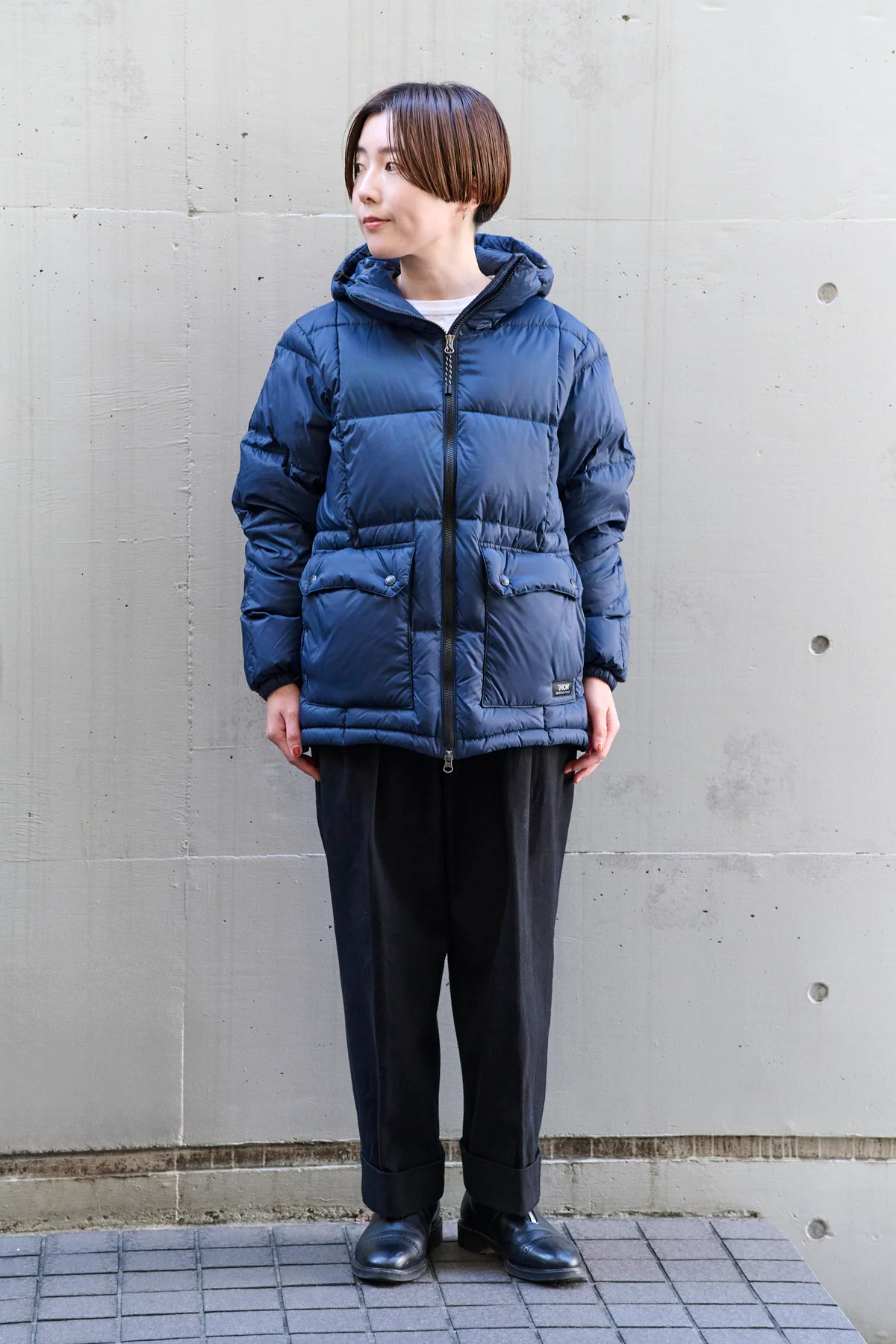 タイオンのパッカブル ボリューム ダウンパーカ