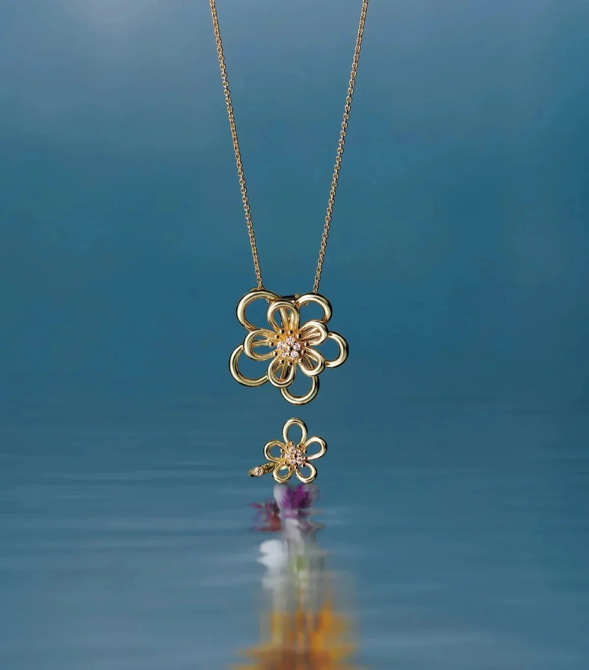 ヴァン クリーフ&アーペル "フラワーレース"クリップペンダントとアントレ レ ドア リング