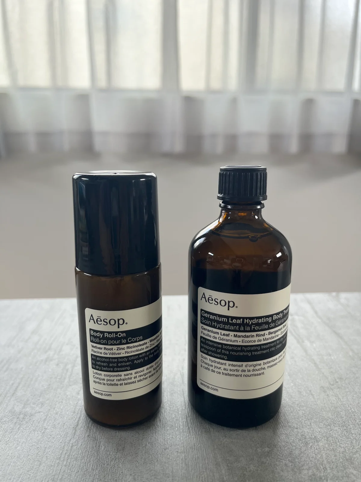 Aesop イソップ　左 イソップ ボディ ロールオン 50ml ￥4,400・右 ゼラニウム ボディトリートメント 100ml ￥4,950