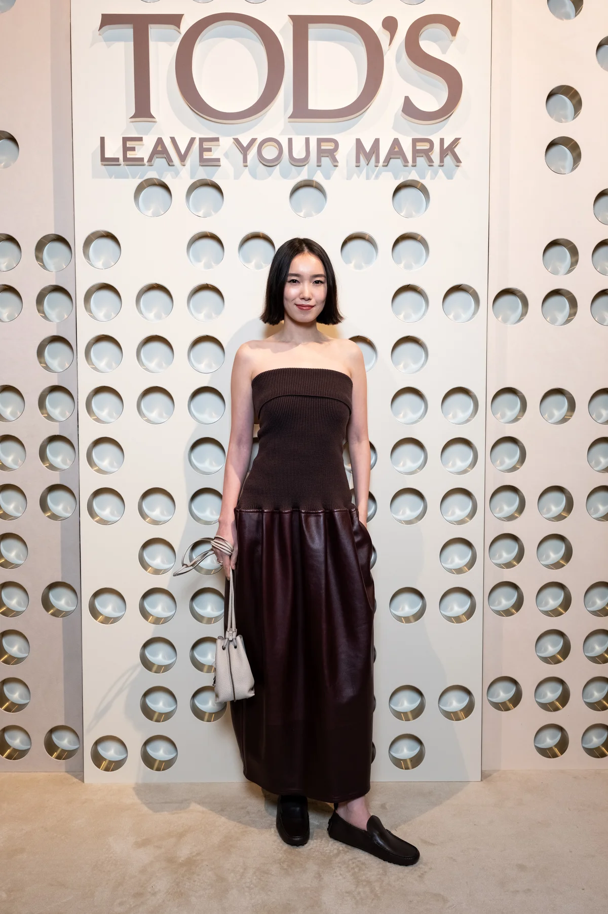トッズ 2026年春夏コレクションに来場した飯豊まりえさん