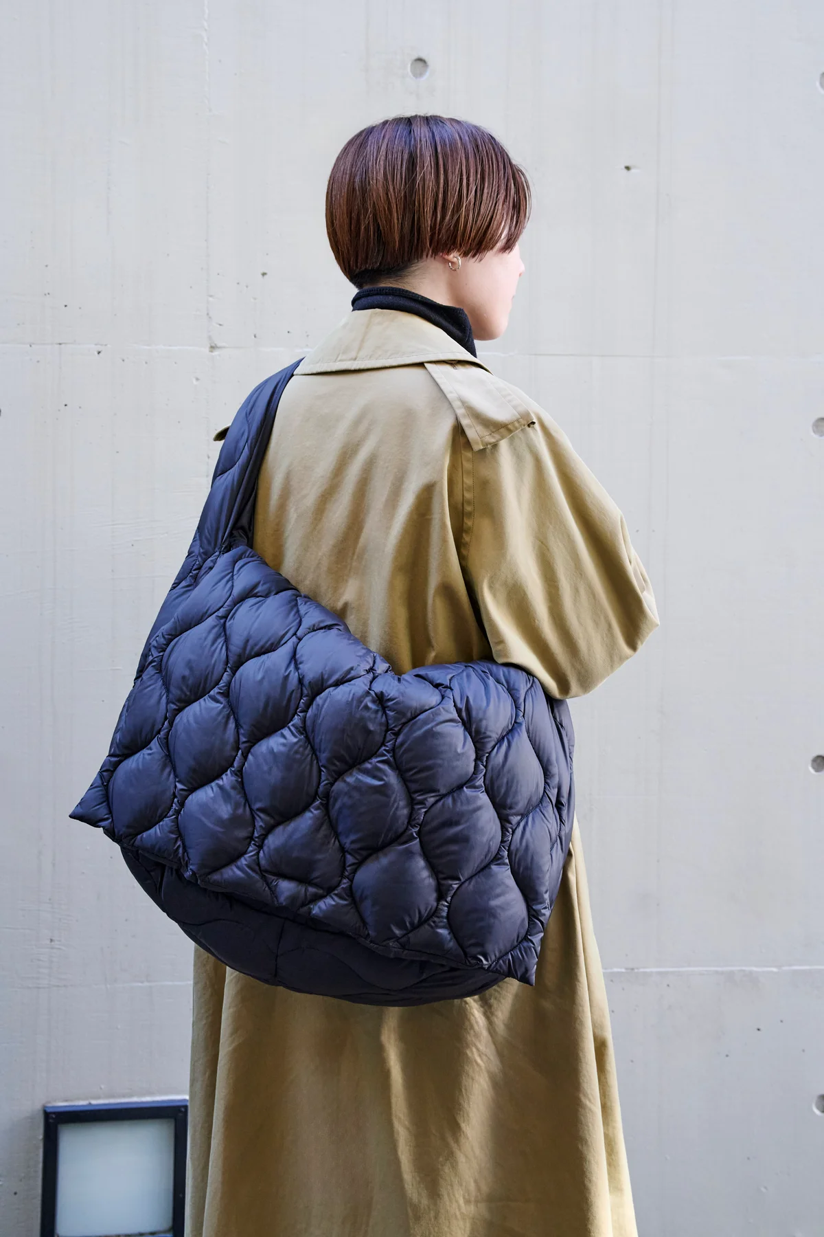 タイオンのメッセンジャーダウンバッグ