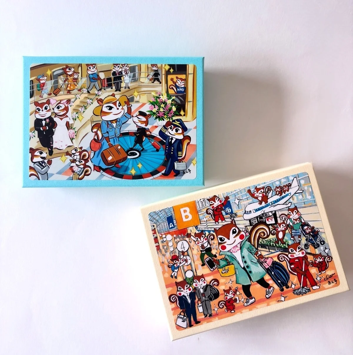 西光亭のくるみクッキーに、羽田空港限定のキュートなパッケージが！　ターミナル1と2の二つのバージョンがある