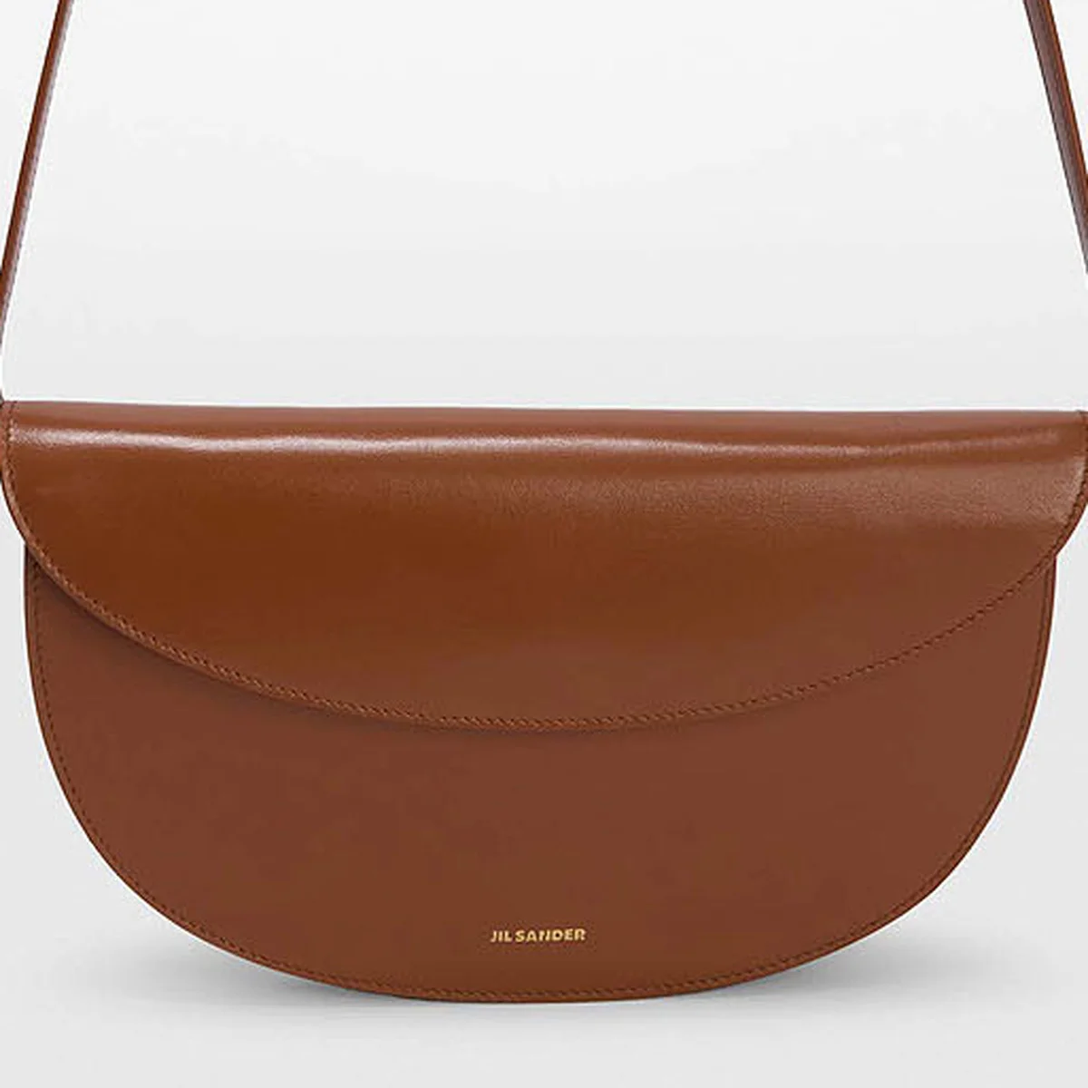 【ジル サンダー】の財布。都会的なカーブフォルムの2WAYウォレットバッグ